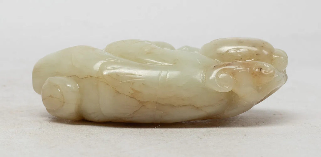 Moheule Figure  Boy Holding Lingzhi with a Climbing Cat China (17th Century)