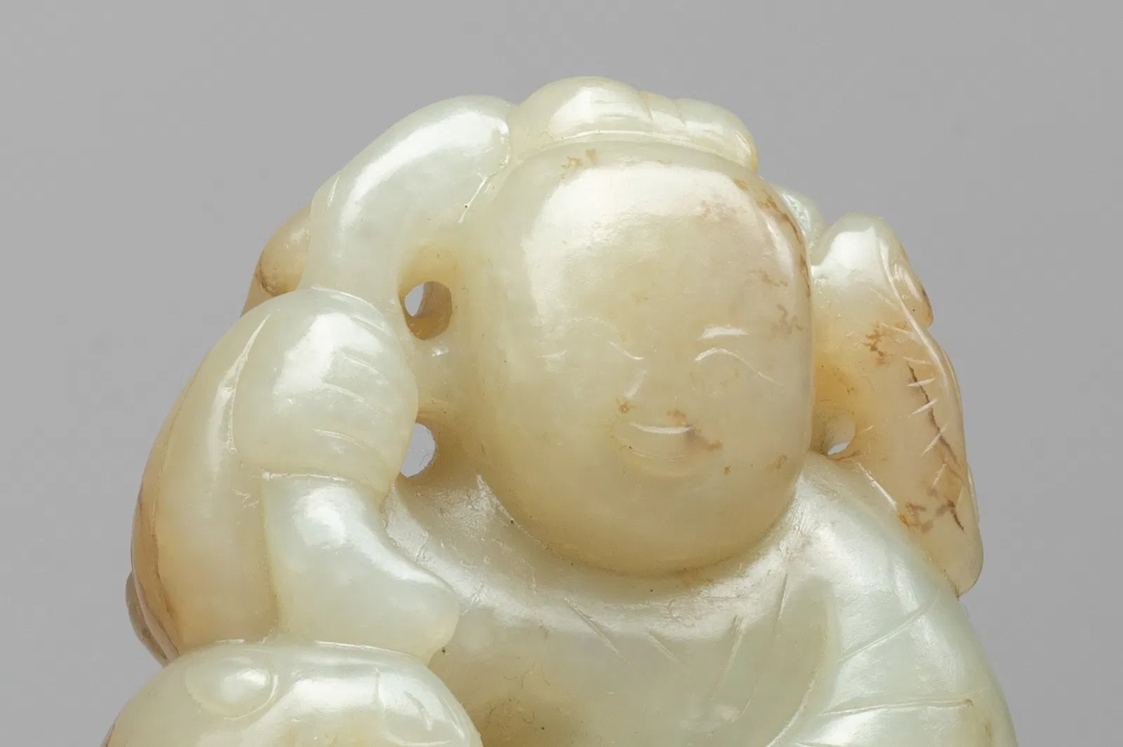 Moheule Figure  Boy Holding Lingzhi with a Climbing Cat China (17th Century)