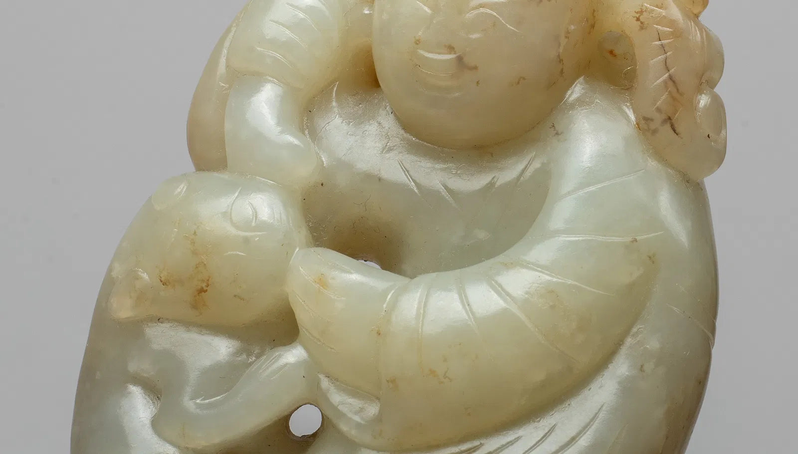 Moheule Figure  Boy Holding Lingzhi with a Climbing Cat China (17th Century)