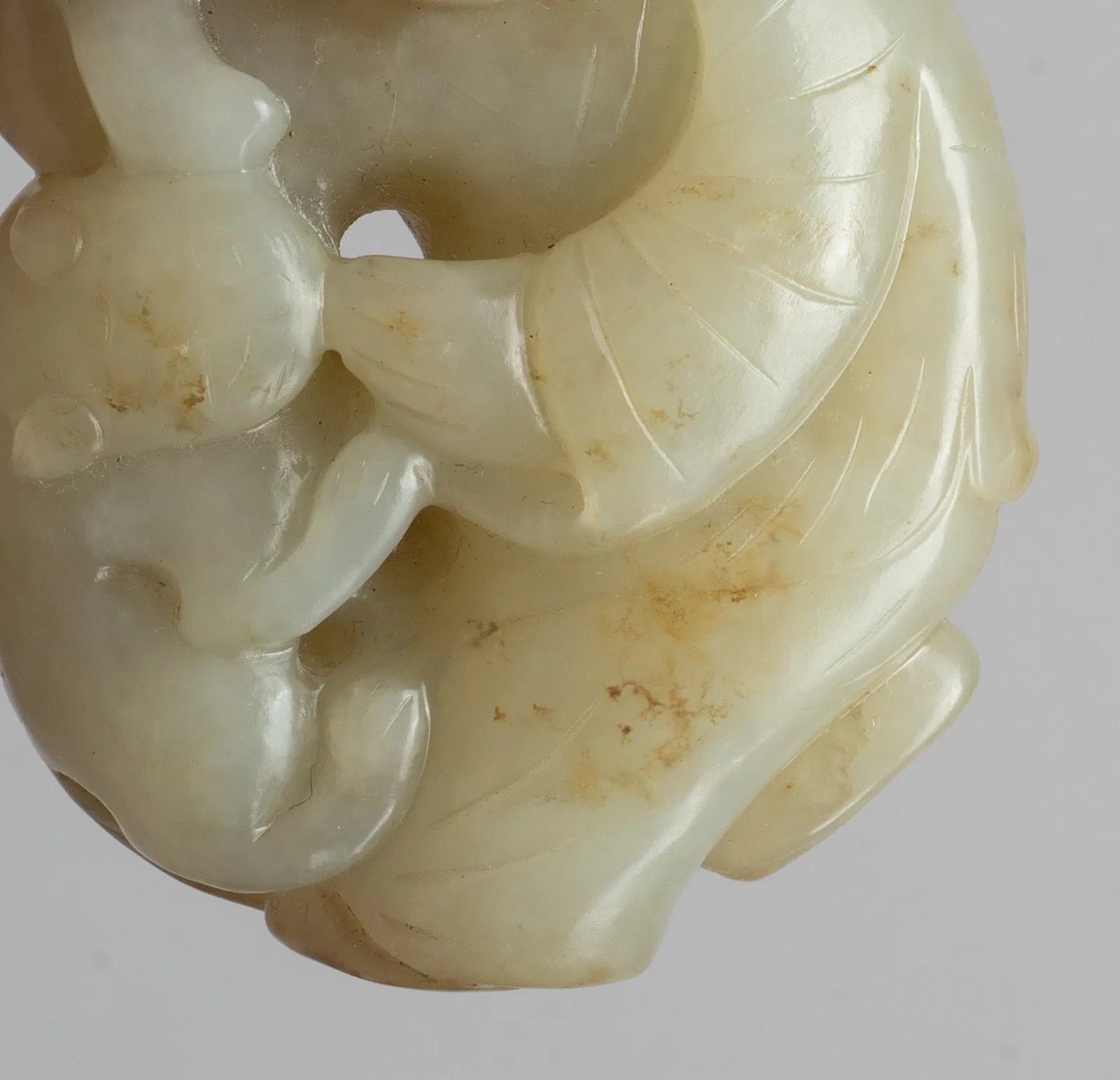 Moheule Figure  Boy Holding Lingzhi with a Climbing Cat China (17th Century)