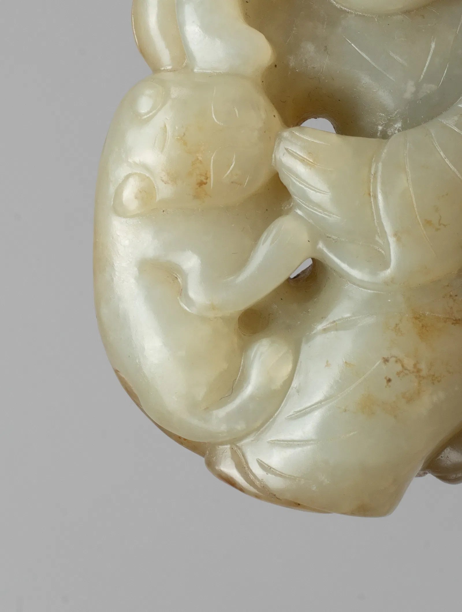 Moheule Figure  Boy Holding Lingzhi with a Climbing Cat China (17th Century)